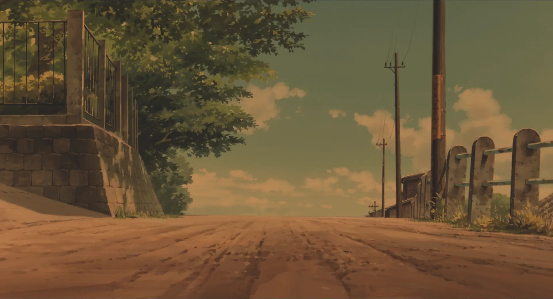 a_dirt_road_with_trees_and_power_lines.png