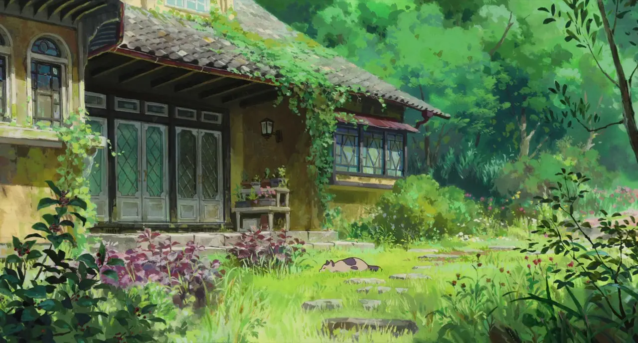 a_house_with_plants_and_flowers.jpeg