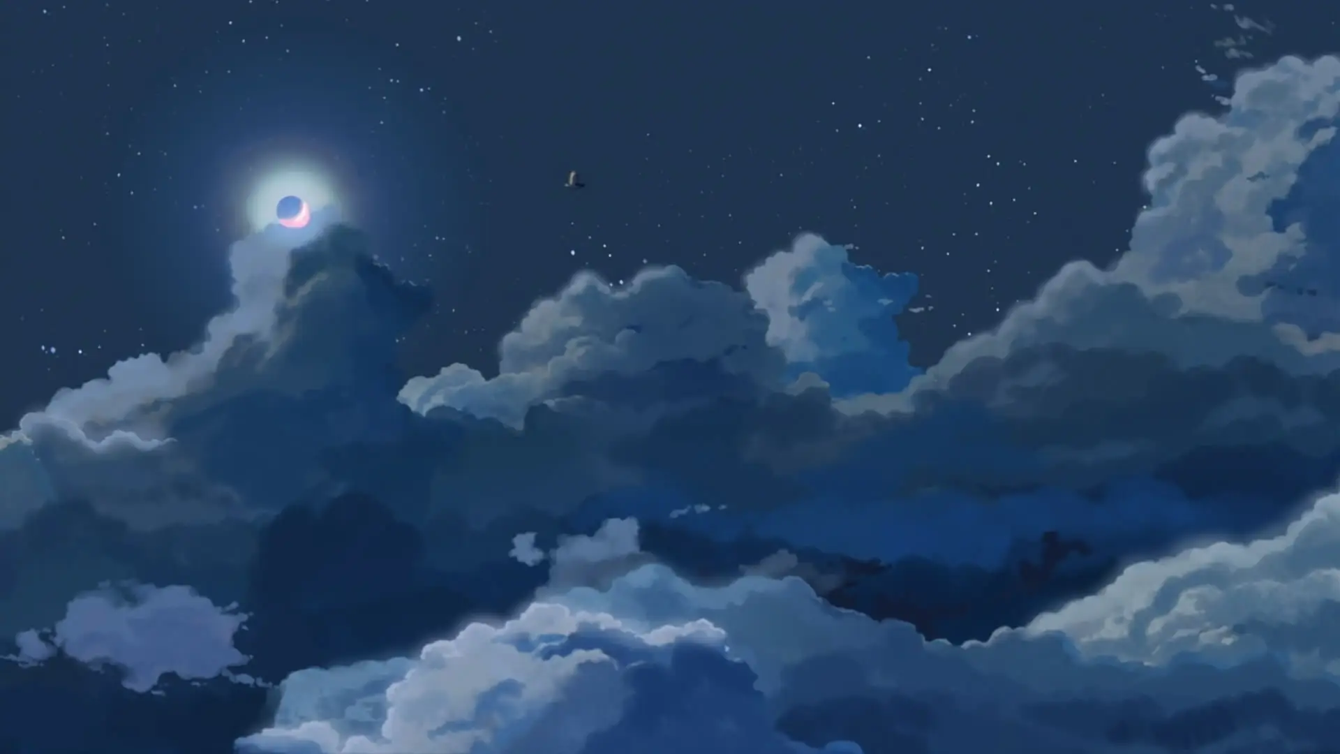 a_moon_and_clouds_at_night.jpg