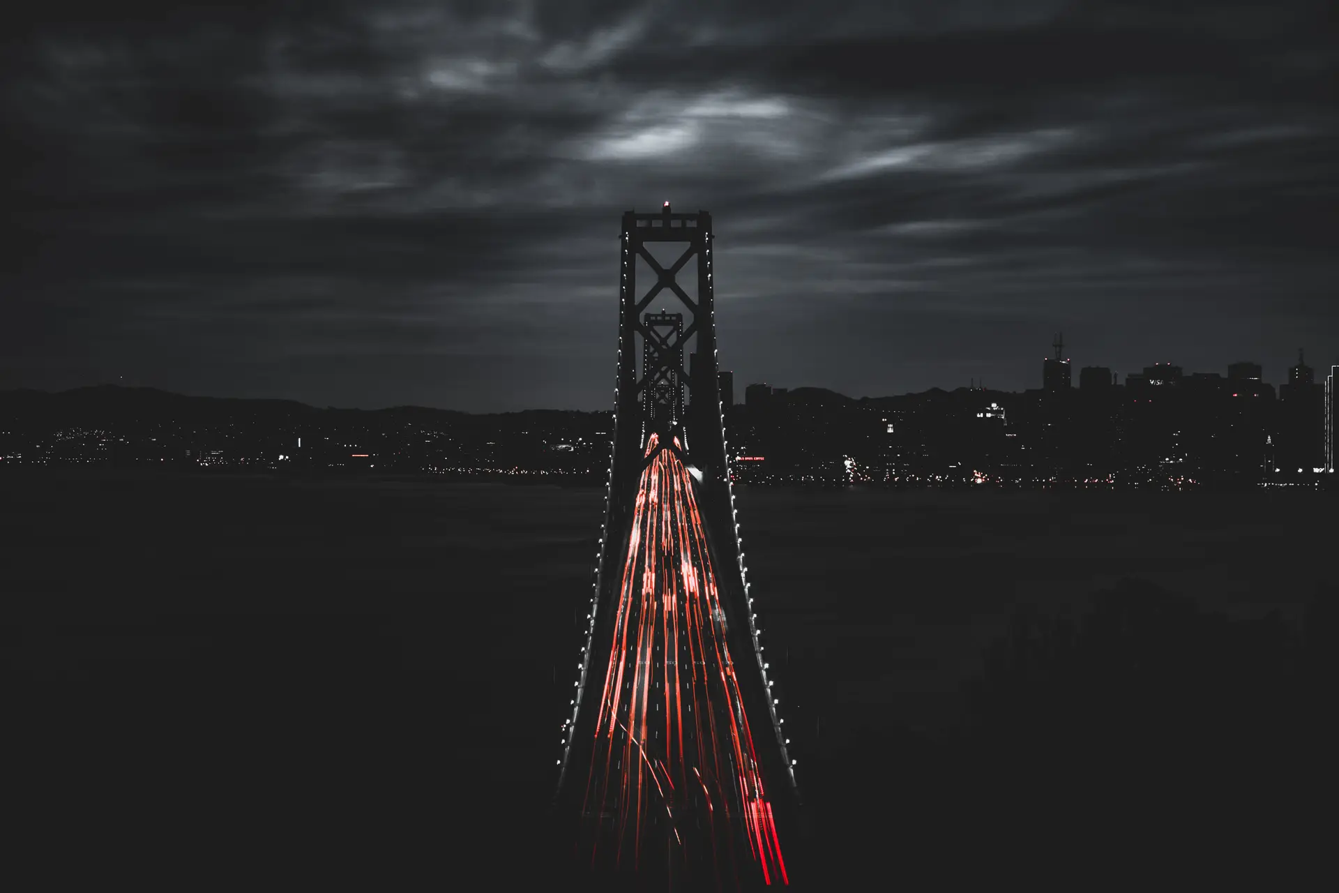 a_bridge_with_lights_on_it.jpg