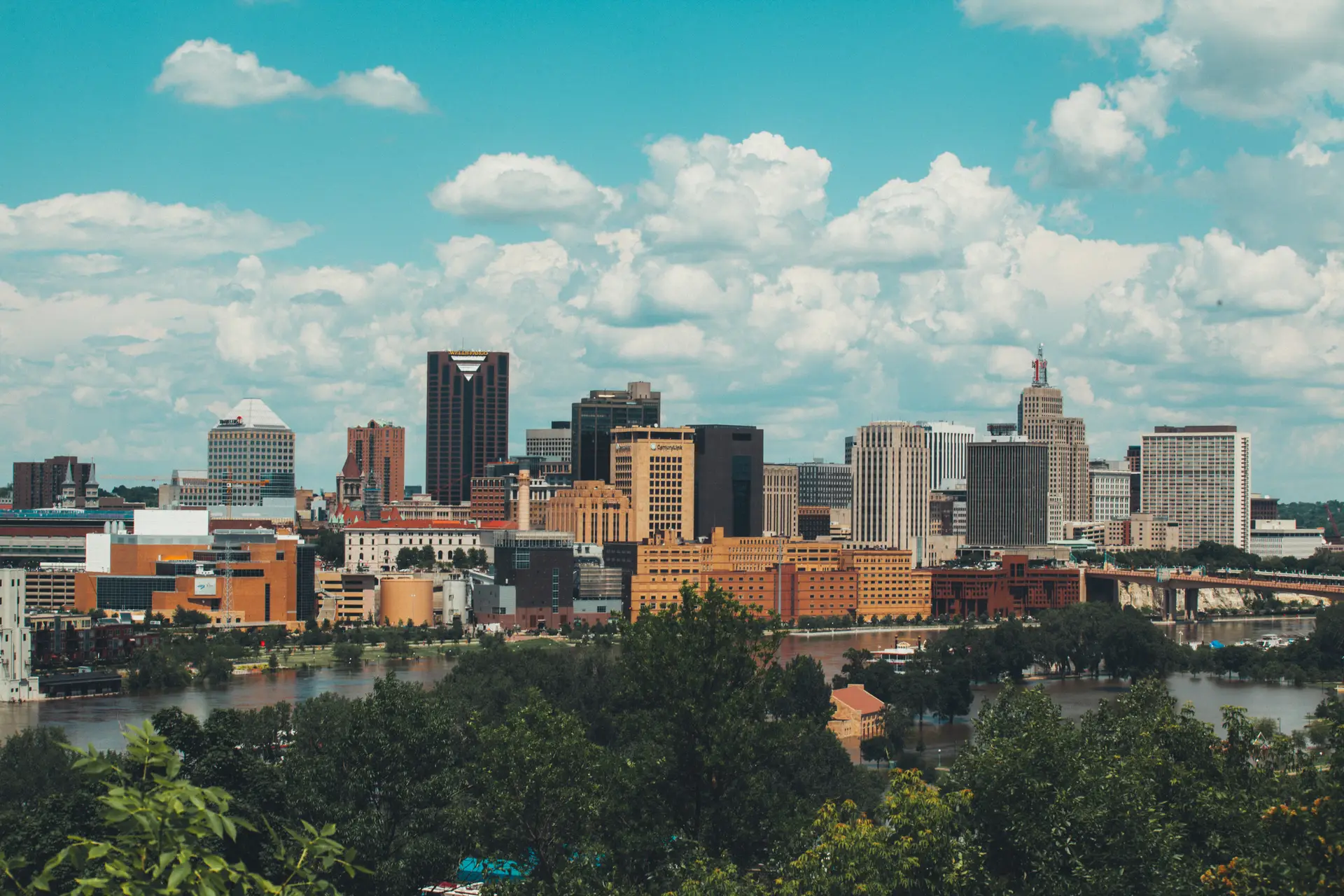 a_city_with_trees_and_water.jpg