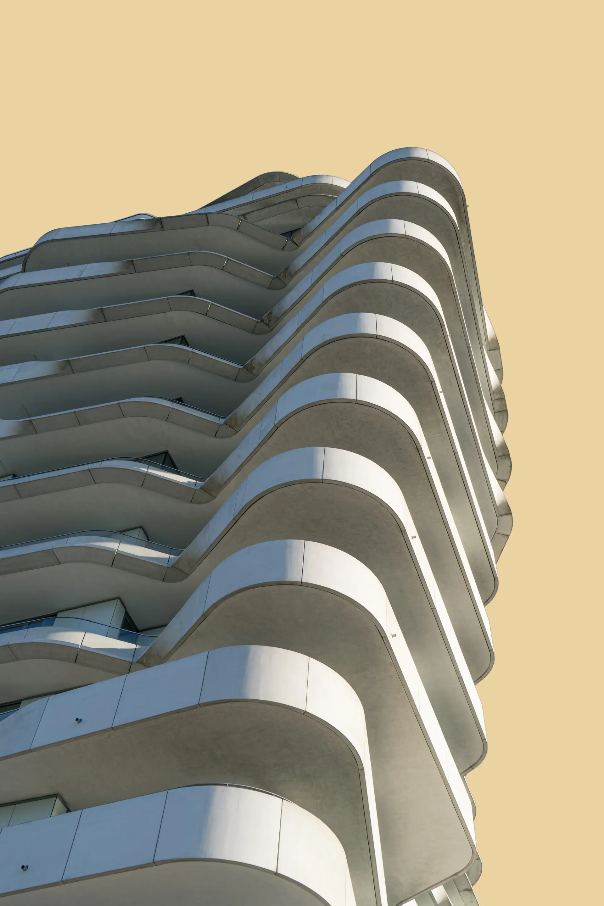 a_tall_building_with_balconies.jpg