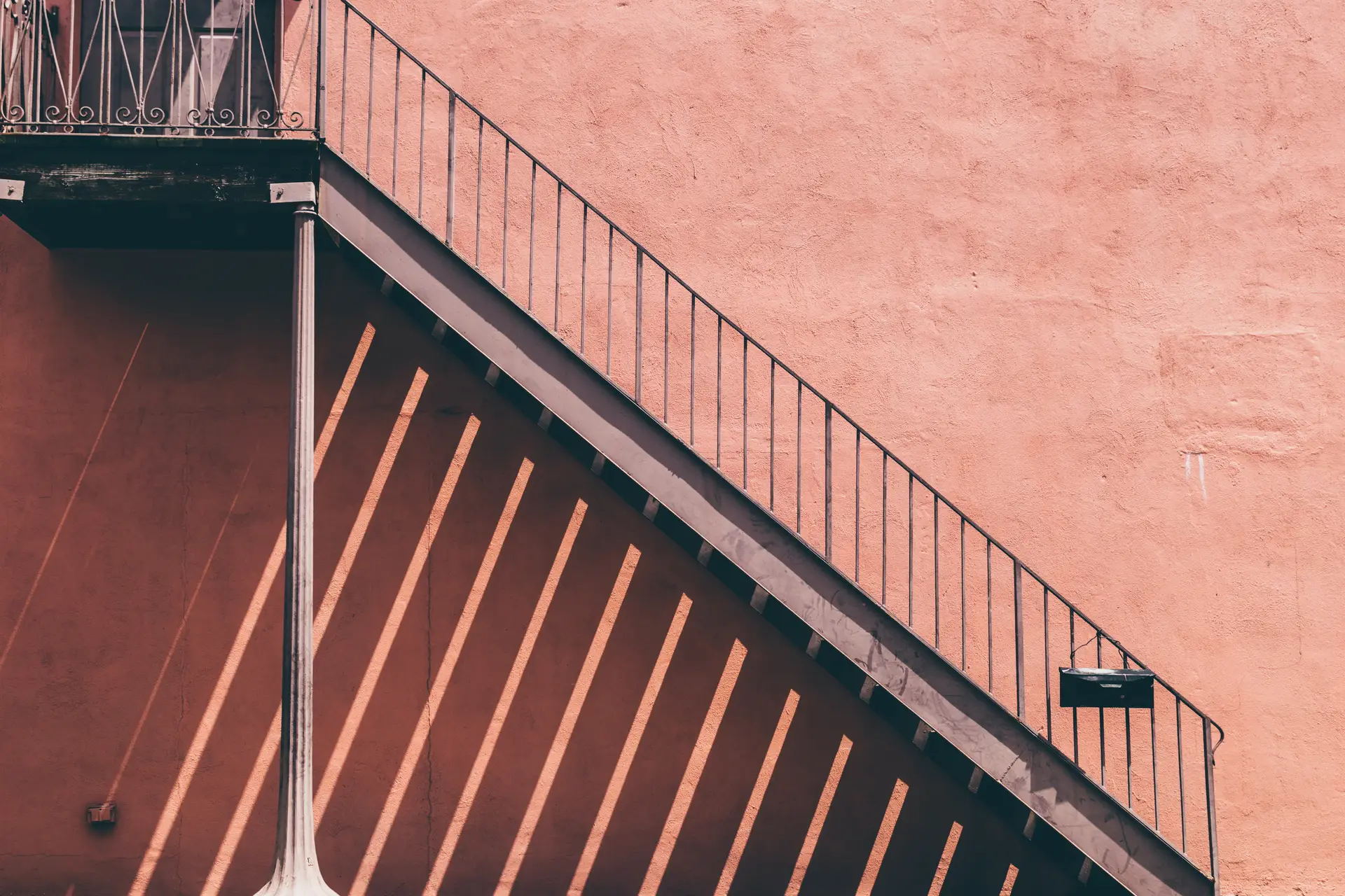 a_metal_staircase_with_a_railing.jpg