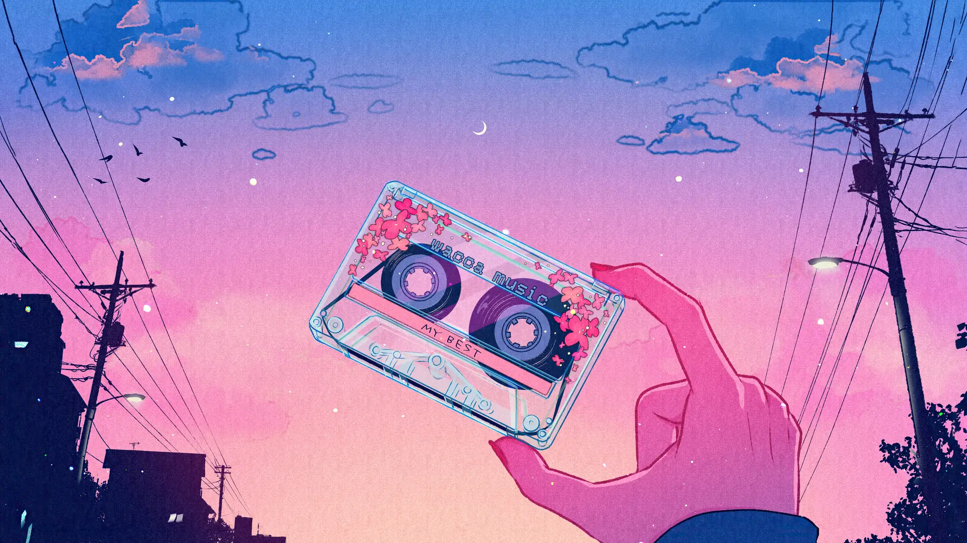 a_hand_holding_a_cassette_tape.jpg