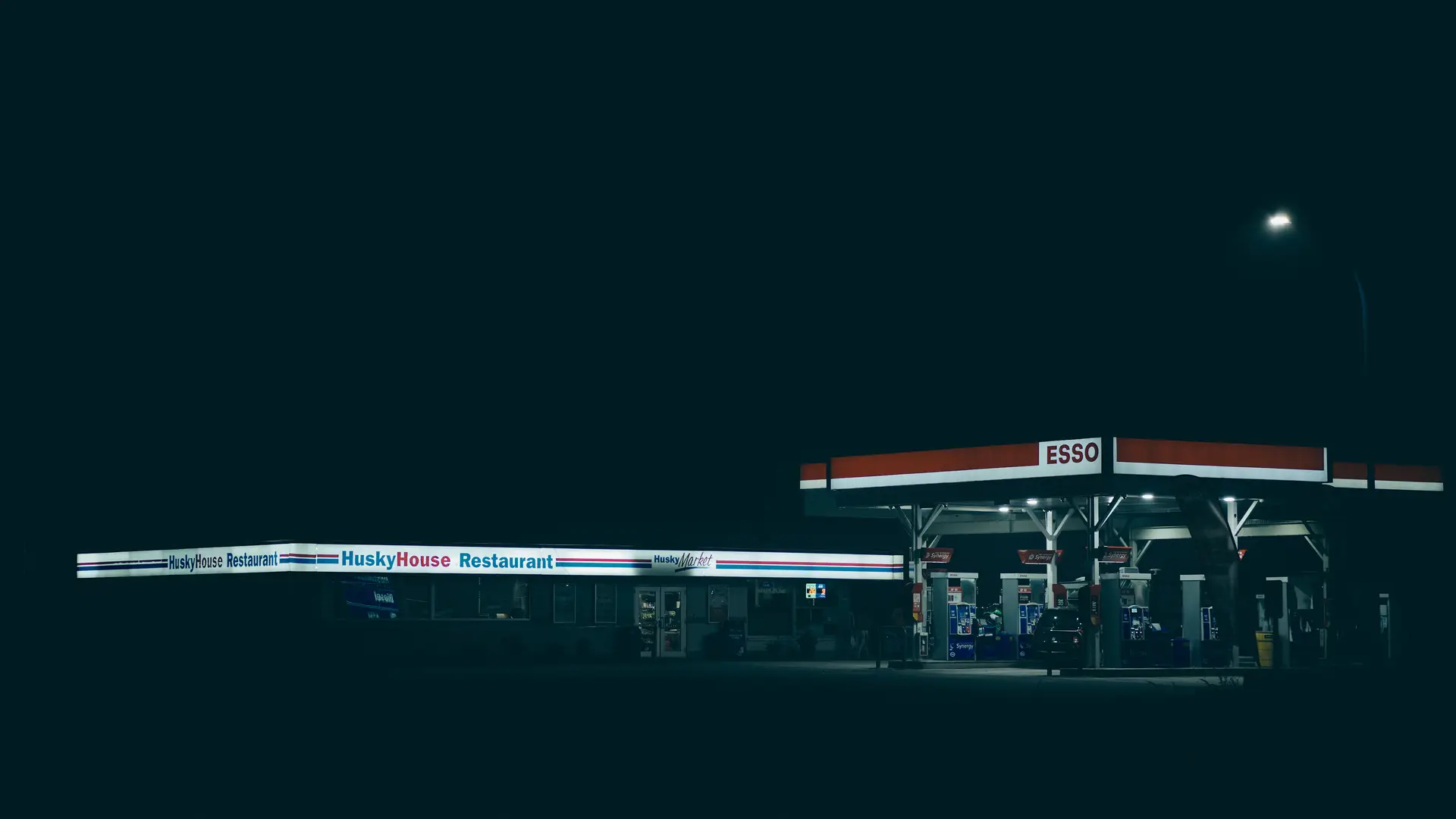 a_gas_station_at_night.jpg