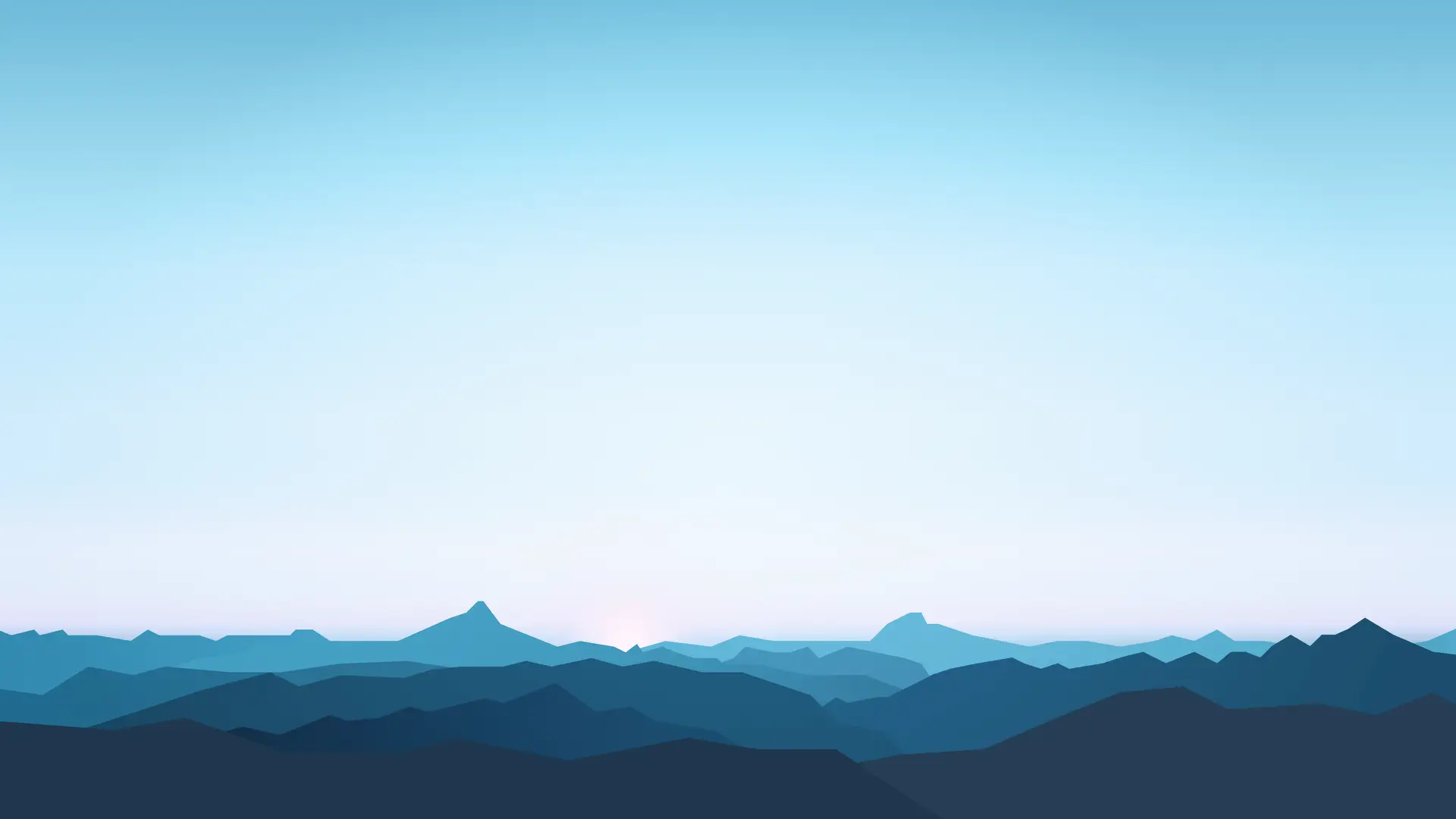 a_blue_sky_over_a_mountain_range.png