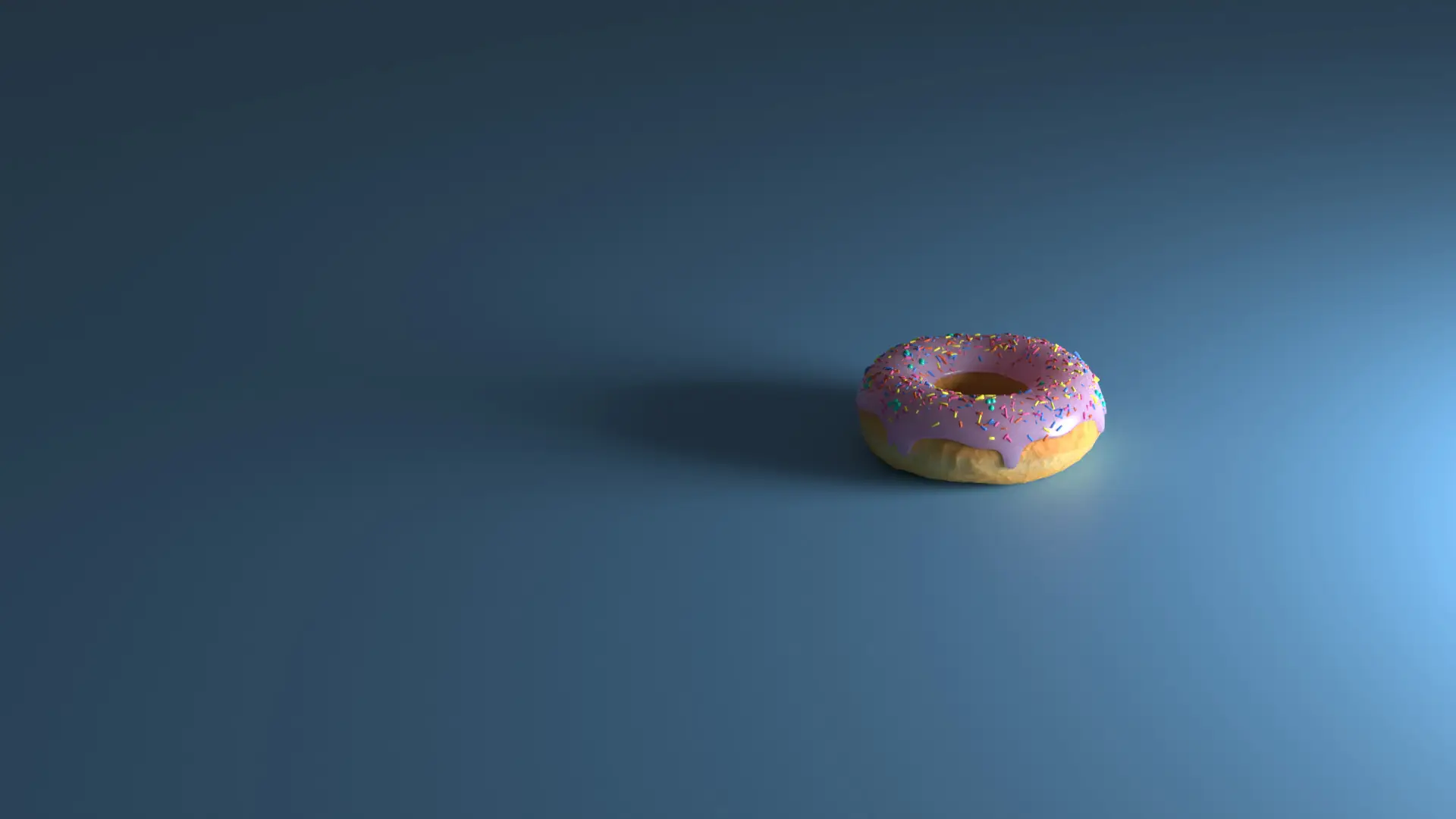 a_donut_with_sprinkles_on_top.jpg