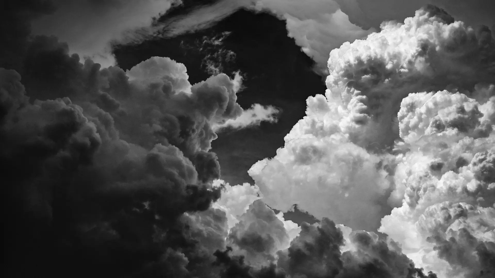 a_black_and_white_photo_of_clouds.jpg