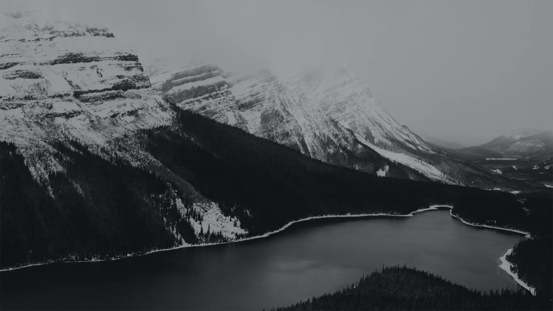 a_lake_surrounded_by_mountains.jpg