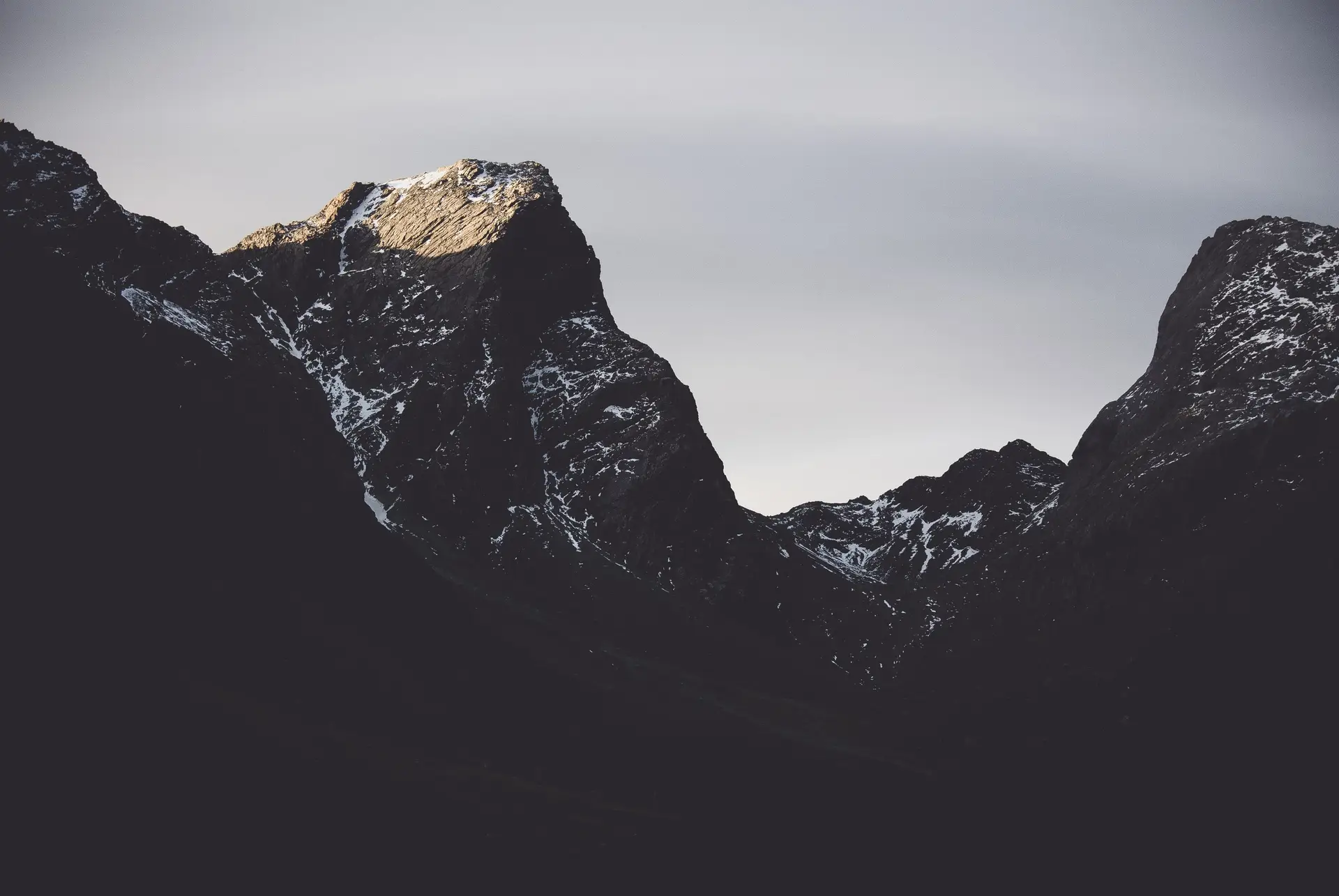 a_mountain_range_with_snow_on_top.jpg