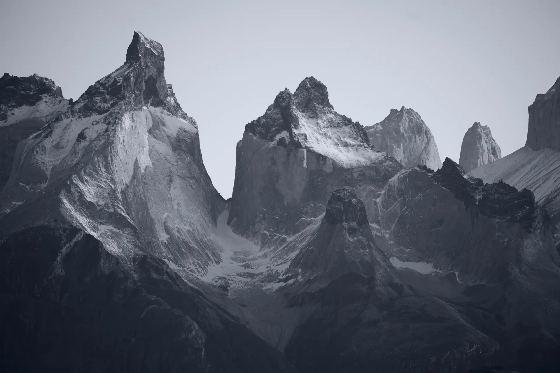 a_mountain_range_with_snow_on_top.jpg