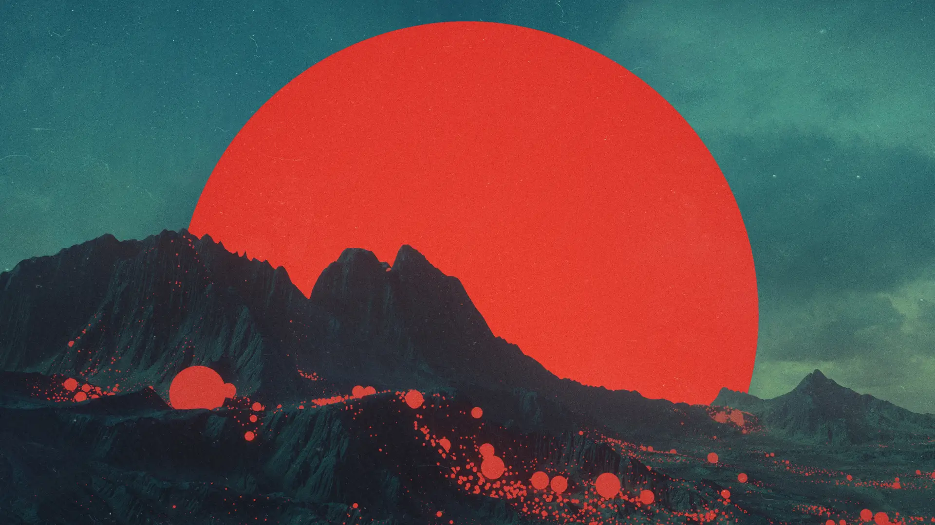 a_red_sun_over_mountains.jpg