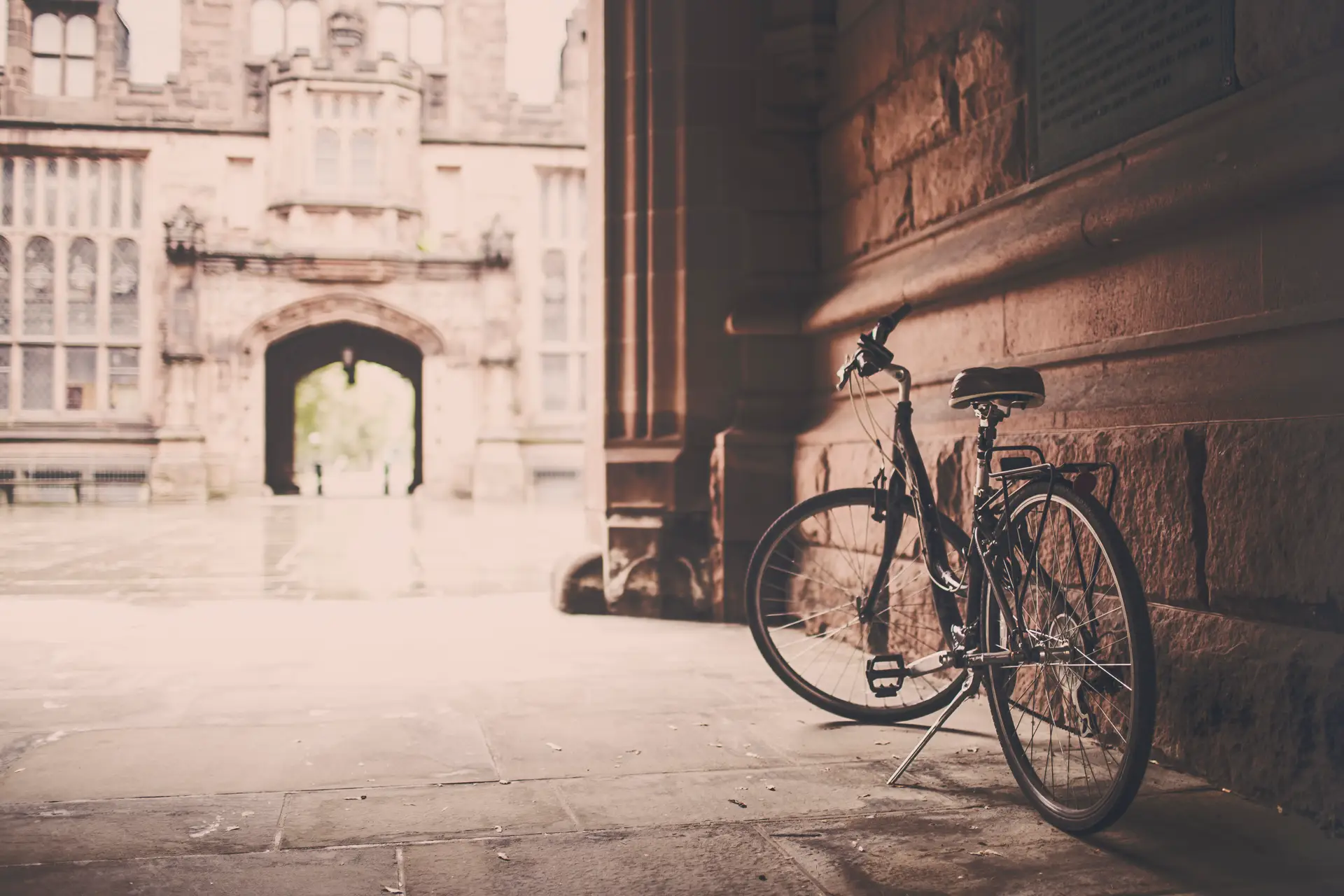 a_bicycle_leaning_against_a_wall.jpg