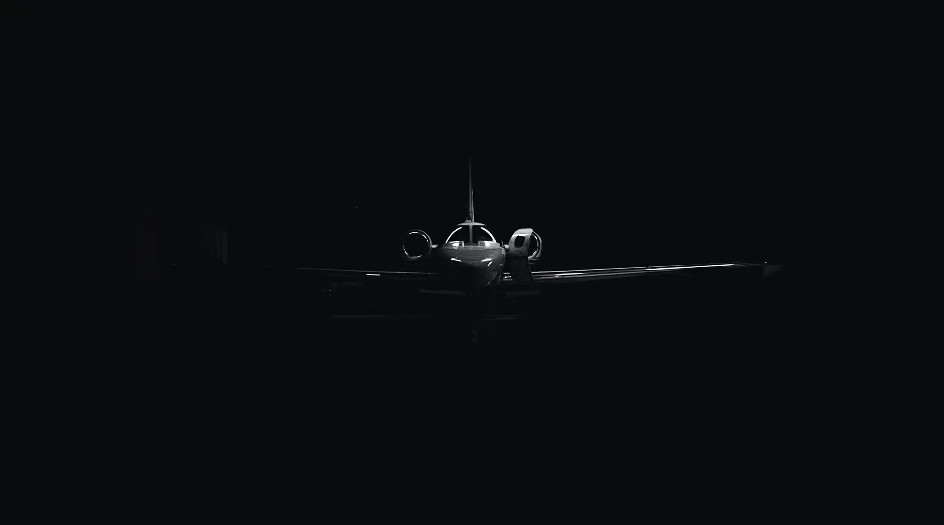 a_plane_in_the_dark.jpg